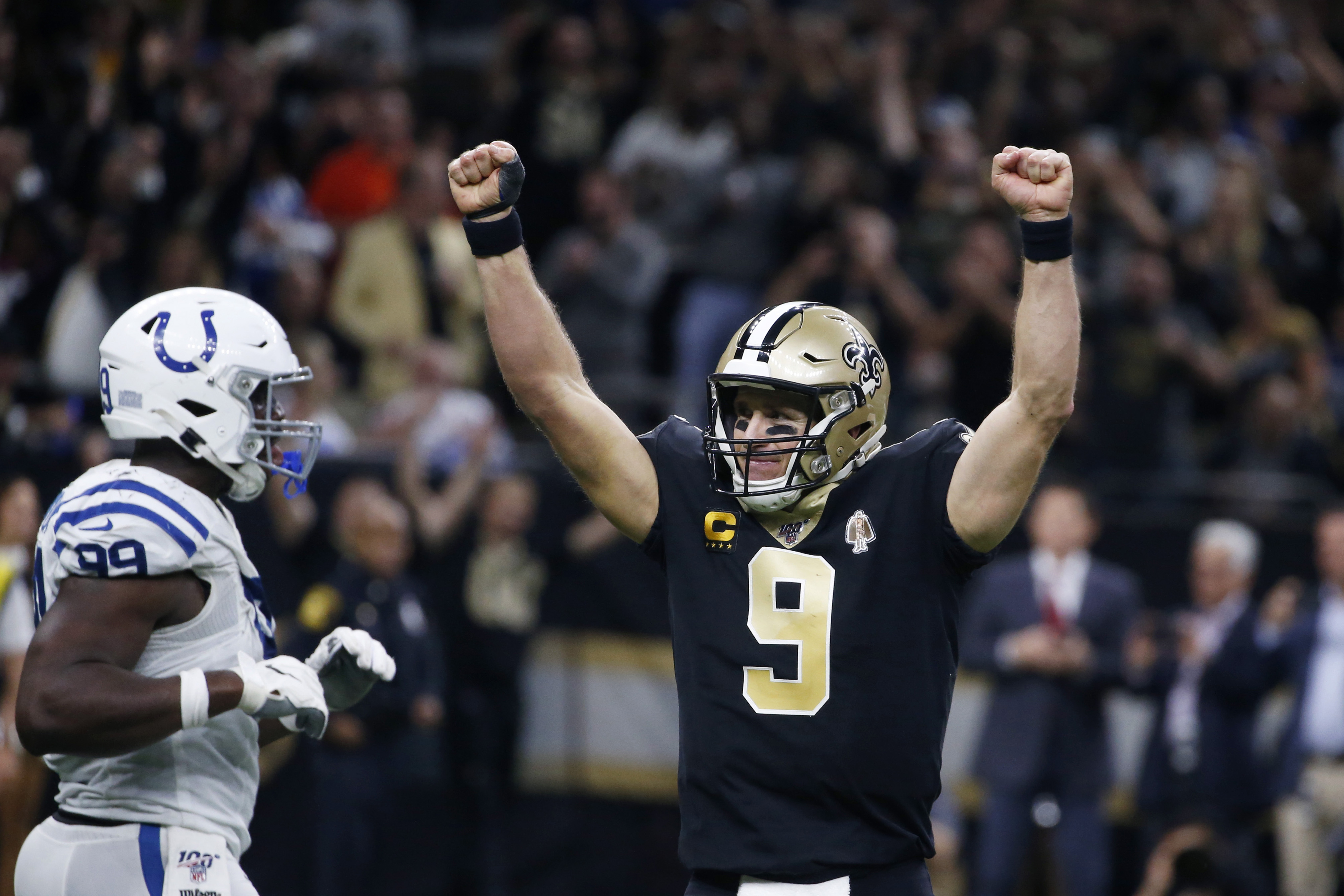 New Orleans Saints quarterback Drew Brees (9) runs off the field after  defeating the Indianapolis Colts 34-7 in an NFL football game in New  Orleans, Monday, Dec. 16, 2019. Brees broke the