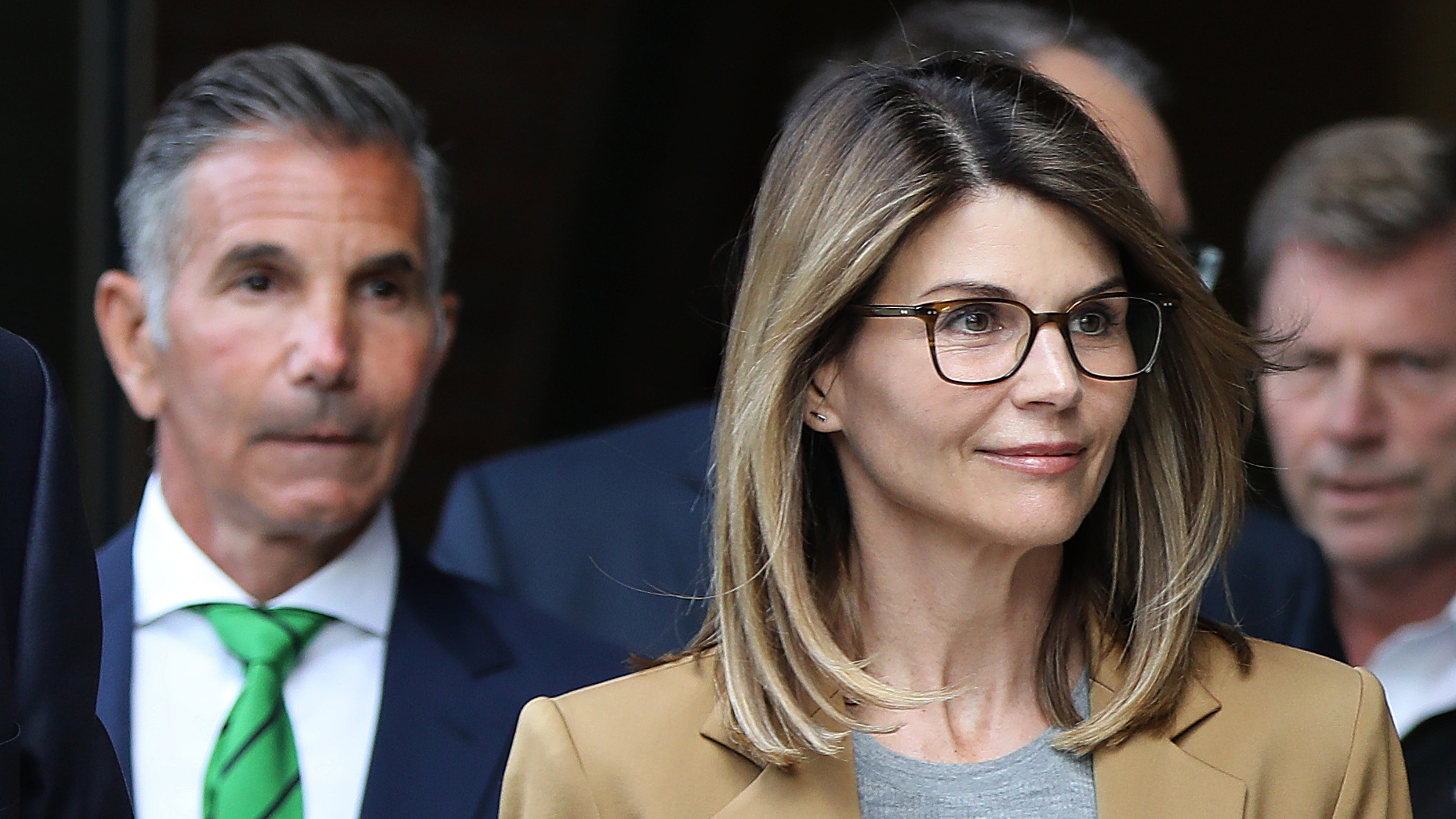 Actress Lori Loughlin and her designer husband Mossimo Giannulli will both serve prison time after paying to get their daughters into USC; Molly Line has an update.