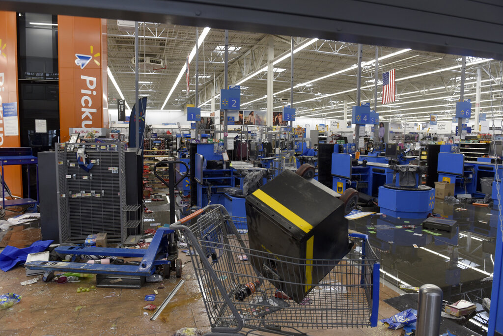 Walmart pulls guns from display over 'civil unrest' concerns - BBC News