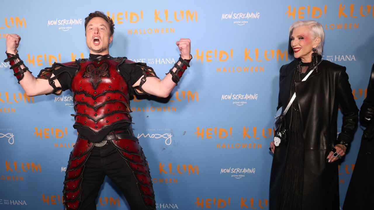 Elon Musk's BIG RED Halloween Costume gets VILIFIED! MUST SEE PHOTOS  (inside)