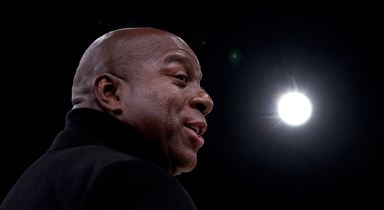 Magic Johnson joins Sixers owner Josh Harris' group in bid to buy the NFL's  Washington Commanders