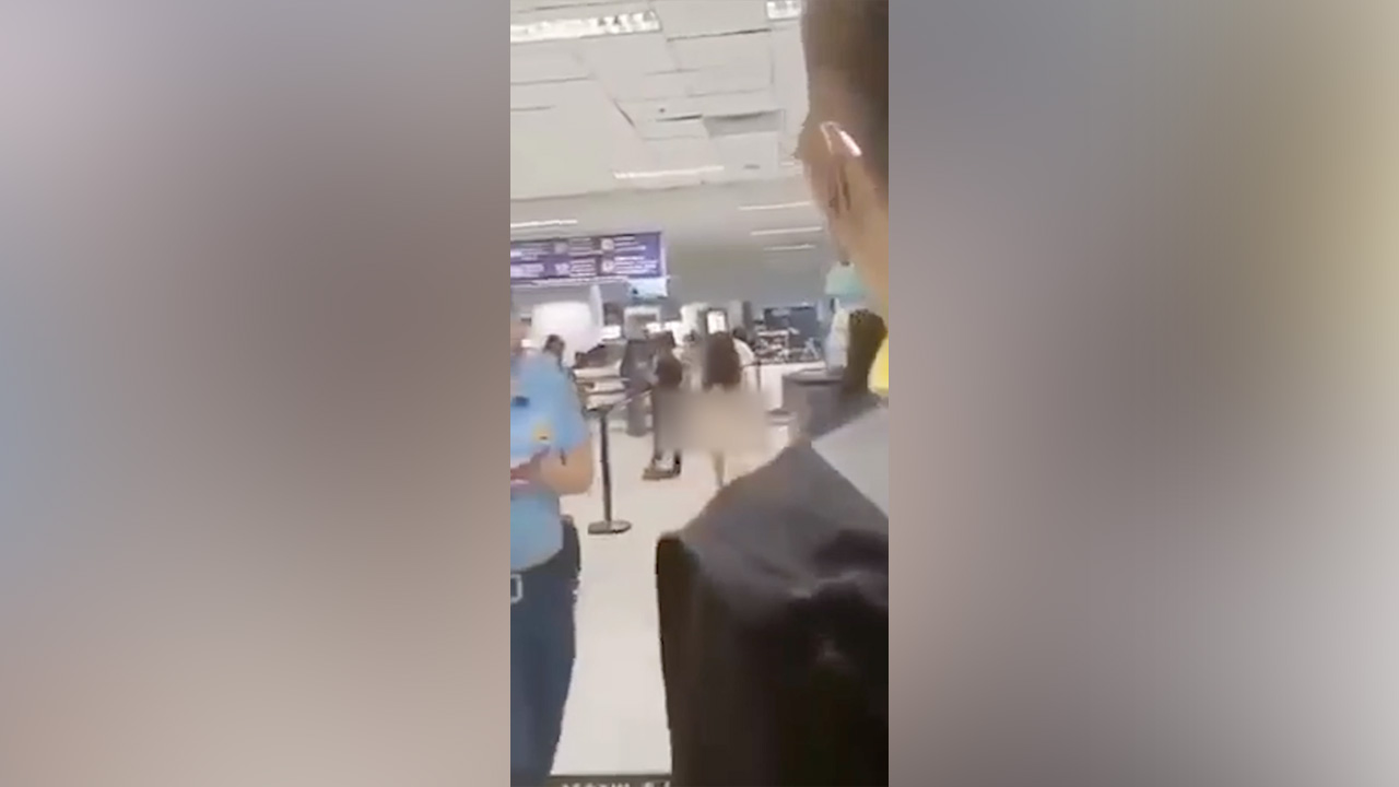 Naked woman in Philippines airport walks through security in fit over visa  issue | Fox Business