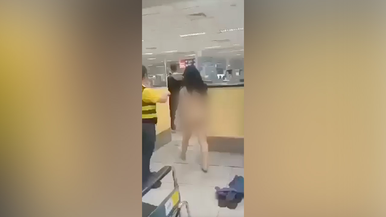 Naked woman in Philippines airport walks through security in fit over visa  issue | Fox Business