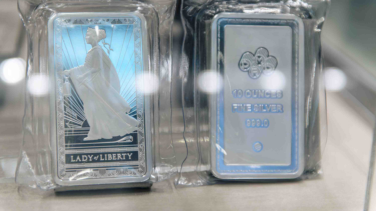Silver surpasses $50 an ounce for first time amid geopolitical, economic uncertainty